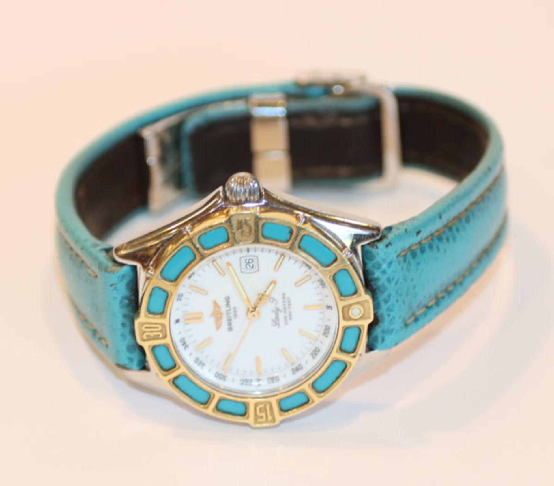 Breitling Damen-Armbanduhr Lady J, Stahl/Gold, mit türkisfarbenem Original-Armband, intakt, benötigt