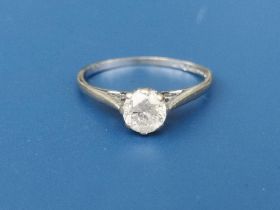 A diamond solitaire ring, the 0.50 carat claw set brilliant on 18ct white gold shank. Finger size