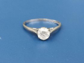 A diamond solitaire, the claw set stone weighing approximately 0.25 carat on 375 shank. Finger