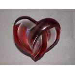 A boxed Lalique red satin glass 'Coeur Entrelaces' heart paperweight, etched signature 'Lalique,