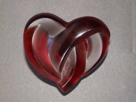 A boxed Lalique red satin glass 'Coeur Entrelaces' heart paperweight, etched signature 'Lalique,