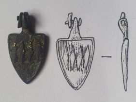 A medieval horse pendant depicting the arms of the Daubenny family, originally from Somerset, 1.2".