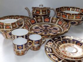 Seven pieces of Royal Crown Derby Japan pattern No. 1128 table china, including an oval teapot, 7.5"