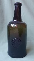 An 18thC sealed glass bottle - S.W. Shepherd 1798, 10.25" high.