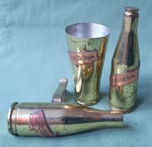 Three pieces of Rhodesia trench art, including a 3.5" bottle opener.