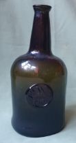 An 18thC sealed glass bottle - S.W. Shepherd Portr - small bruise to body, 9.25" high.