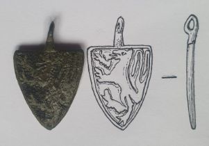 A medieval horse pendant depicting the probable arms of the Montfort family, Earls of Leicester -