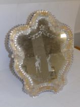 A Venetian glass mirror, 15.5" high.