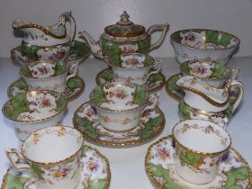 An 18 piece Coalport part tea set decorated flowers with green & gilt borders.