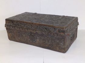 An 18thC Spanish Petaca leather bound wooden document box embossed with animals, birds & flowers.