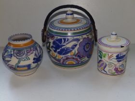 A Carter, Stabler & Adams Poole Pottery swing-handled biscuit barrel decorated stylised birds &