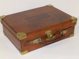 A Victorian leather five-section shotgun cartridge case by Boss of London, 15.75" across.