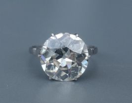 A French old cut diamond solitaire ring, the claw set stone weighing in excess of 5.5 carats on