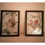 A pair of signed Chinese polychrome painted porcelain plaques, one depicting a cockerel with hen and