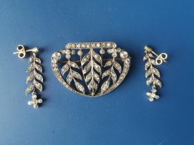 An Edwardian diamond millegrain set openwork panel brooch of shield shape, 1.5" and a pair of drop