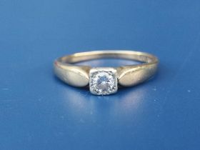 A small 9ct gold illusion set diamond solitaire ring. Finger size L/M.
