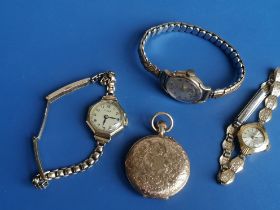 A lady's 9ct gold Visible bracelet wrist watch and two other ladies' gold wrist watches on plated