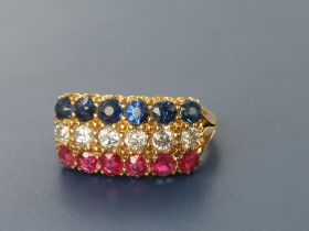 A three row ruby, diamond & sapphire ring, six round cut stones in each row , on 18ct gold shank -