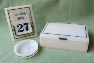 An art deco onyx & malachite desk set, consisting of a lidded box, circular dish & calendar, the box