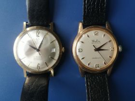 A gent's 9ct gold Verity Searover wrist watch and a gold plated Mudu wrist watch. (2)