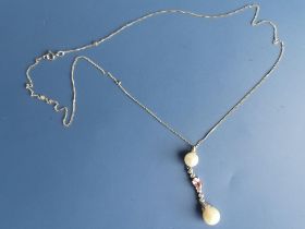 A pearl & diamond set 9ct white gold drop pendant on chain, the pendant 1.6".