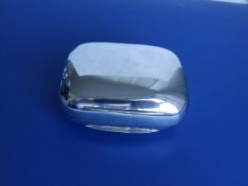 A plain silver sandwich box of rounded rectangular form, initialled 'HAB' to cover, gilt