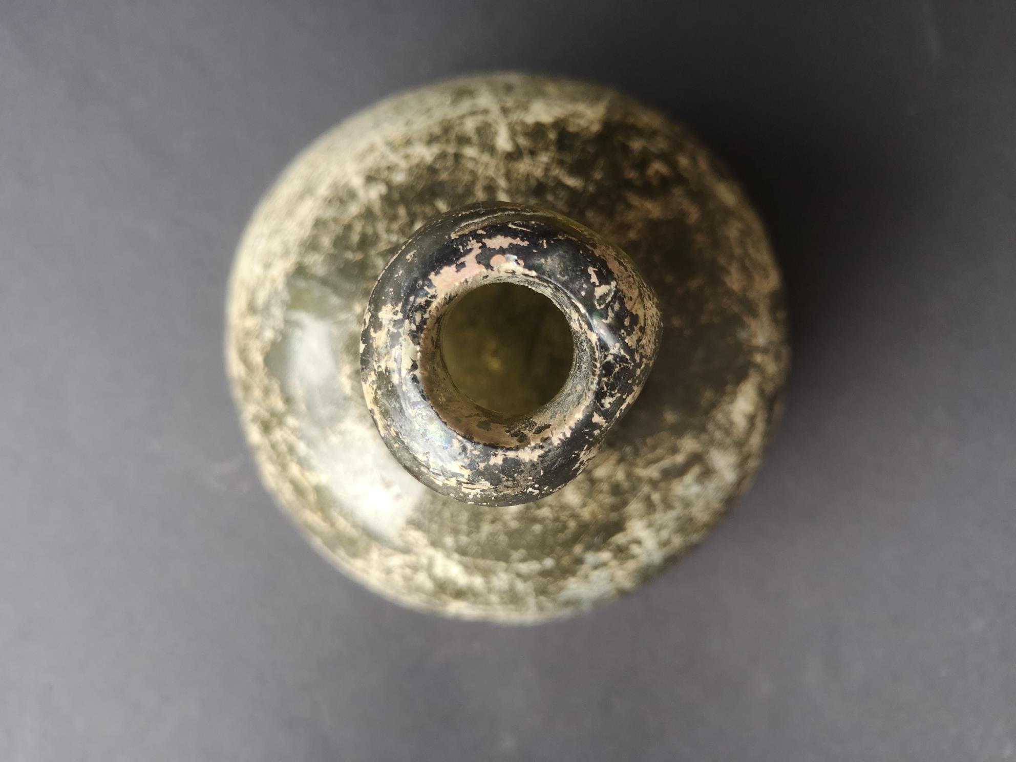 An antique onion shaped glass wine bottle, 6.4" high - crack to side. - Image 3 of 5
