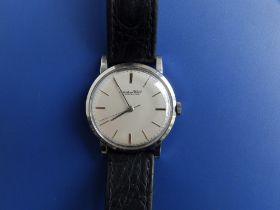 A gent's stainless steel IWC wrist watch, the silver dial with baton numerals, case diameter 35mm,