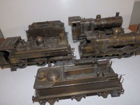 Three unpainted metal O gauge electric locos and two tenders. (5)