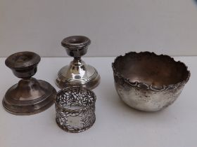 A Walker & Hall Sheffield silver sugar bowl, 3.8" diameter, a pair of dwarf silver candlesticks