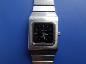 A gent's stainless steel Omega Constellation Automatic bracelet wrist watch with 19mm square black
