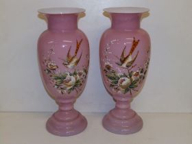 A pair of pink opaque glass vases painted birds & flowers, 12" high. (2)