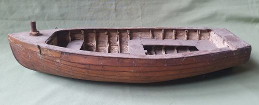 A scratch built model of a boat, 18".
