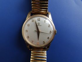 A boxed gent's 9ct gold Omega presentation wrist watch - 'Dent & Sons 1914-1964', the cream dial