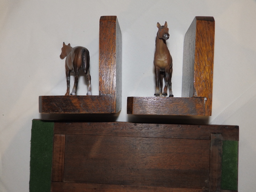 A pair of wooden bookends each mounted with small cold painted lead horse, 5" high together with a - Image 3 of 3