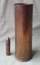 A trench art lighter and shell case, the shell case 11.5" high. (2)