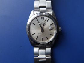 A 1972 gent's stainless steel Tudor Oysterdate bracelet wrist watch, the silvered dial with centre