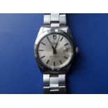 A 1972 gent's stainless steel Tudor Oysterdate bracelet wrist watch, the silvered dial with centre