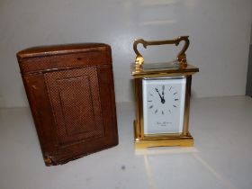 A modern English brass carriage clock by Thos. Braithwaite, 4.25" high excluding handle, in old