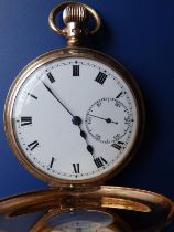 A 9ct gold Dennison cased half hunter pocket watch with white enamel dial, subsidiary seconds - SS &
