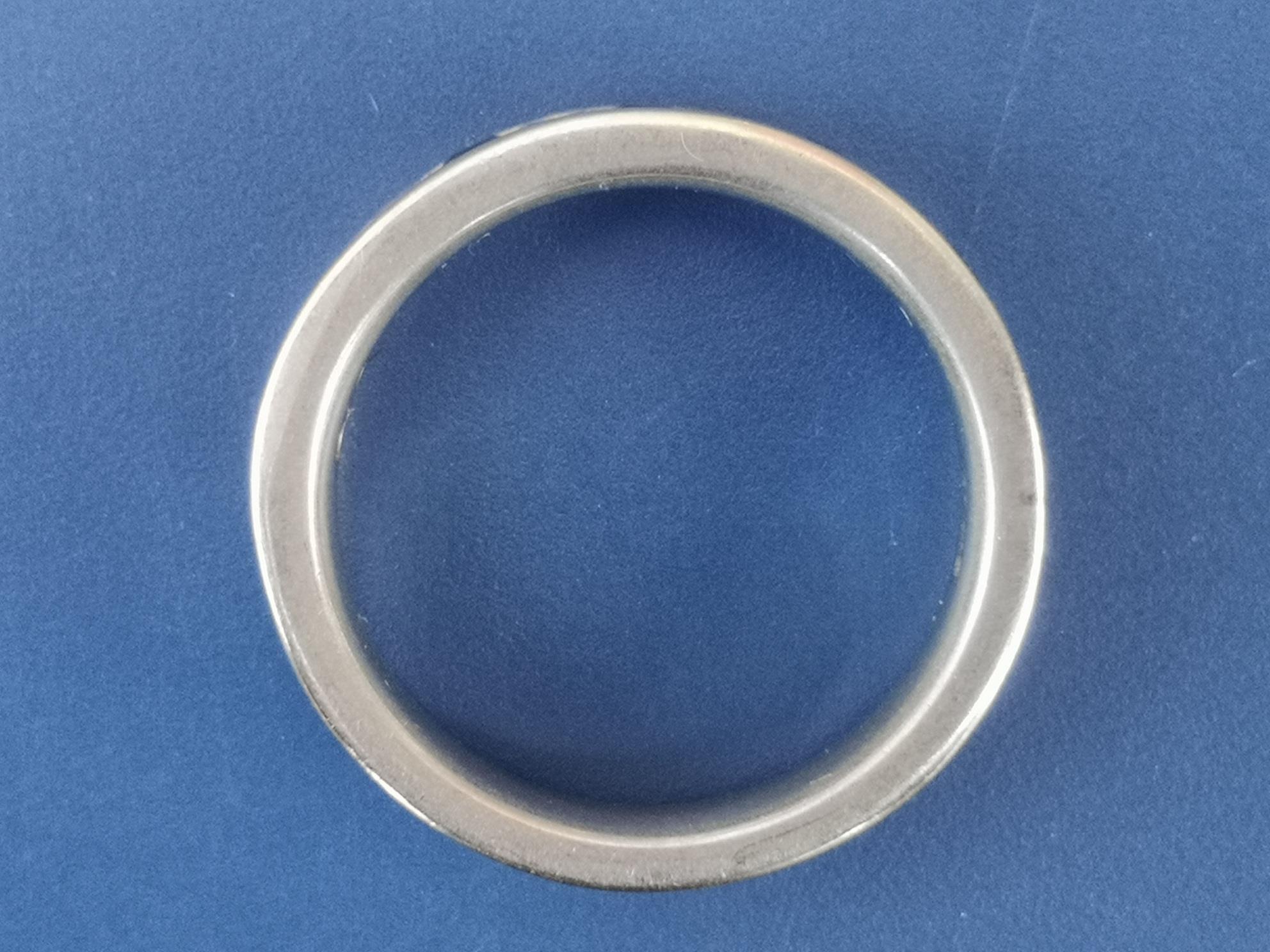 A sapphire & diamond calibre set platinum half eternity ring. Finger size M. - Image 5 of 5