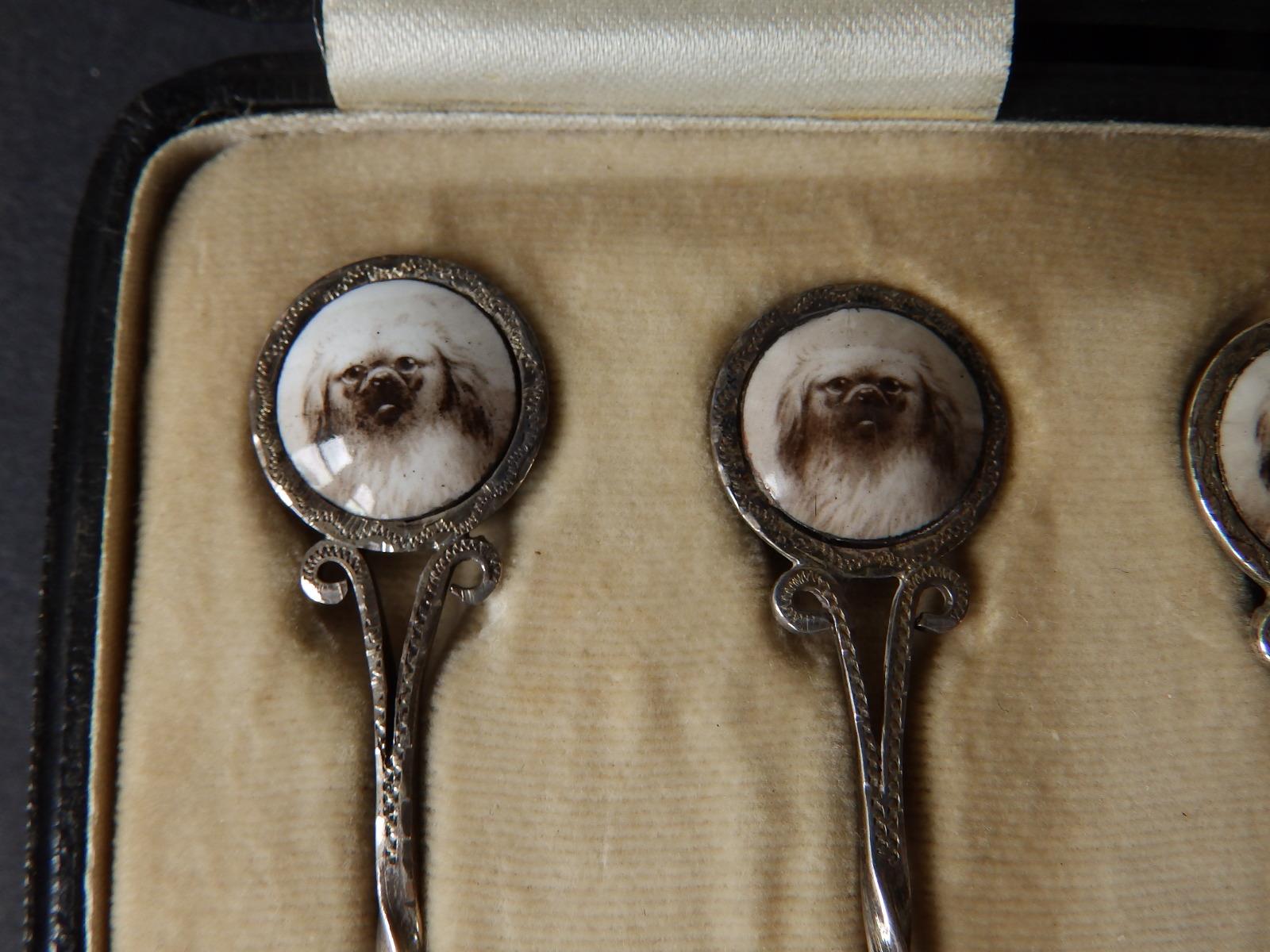 A cased set of six silver teaspoons, the handles inset with a colour printed cabochon portrait of - Image 3 of 5