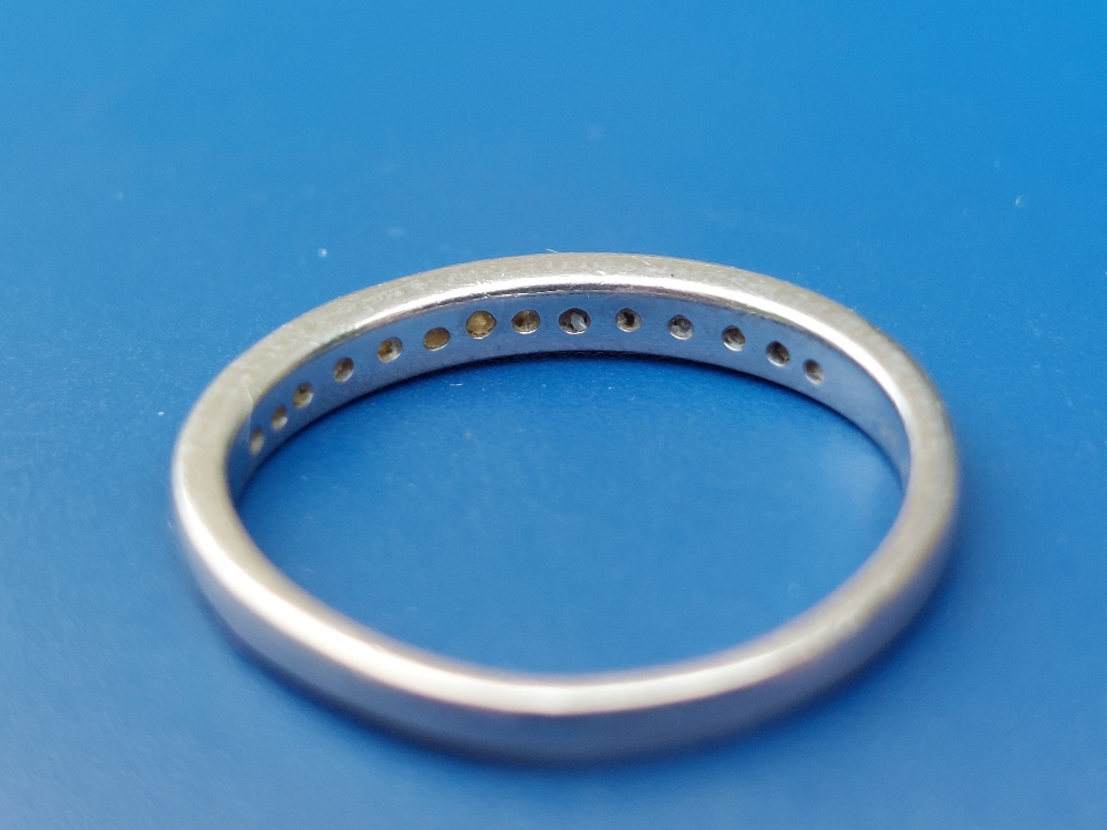 A diamond set platinum half eternity ring - total diamond weight 0.25 carat. Finger size M. - Image 2 of 3