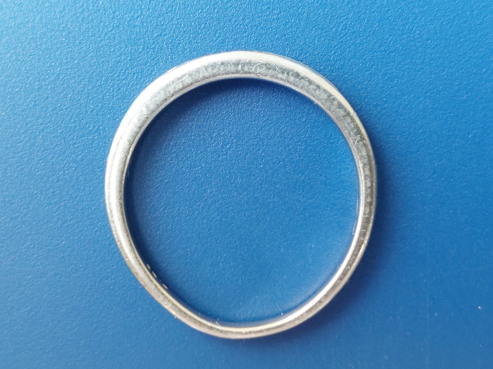 A diamond set platinum half eternity ring - total diamond weight 0.25 carat. Finger size M. - Image 3 of 3
