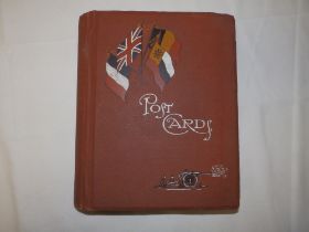 An old postcard album and contents approximately 195 cards including Bonzo & Mabel Lucy Atwell.