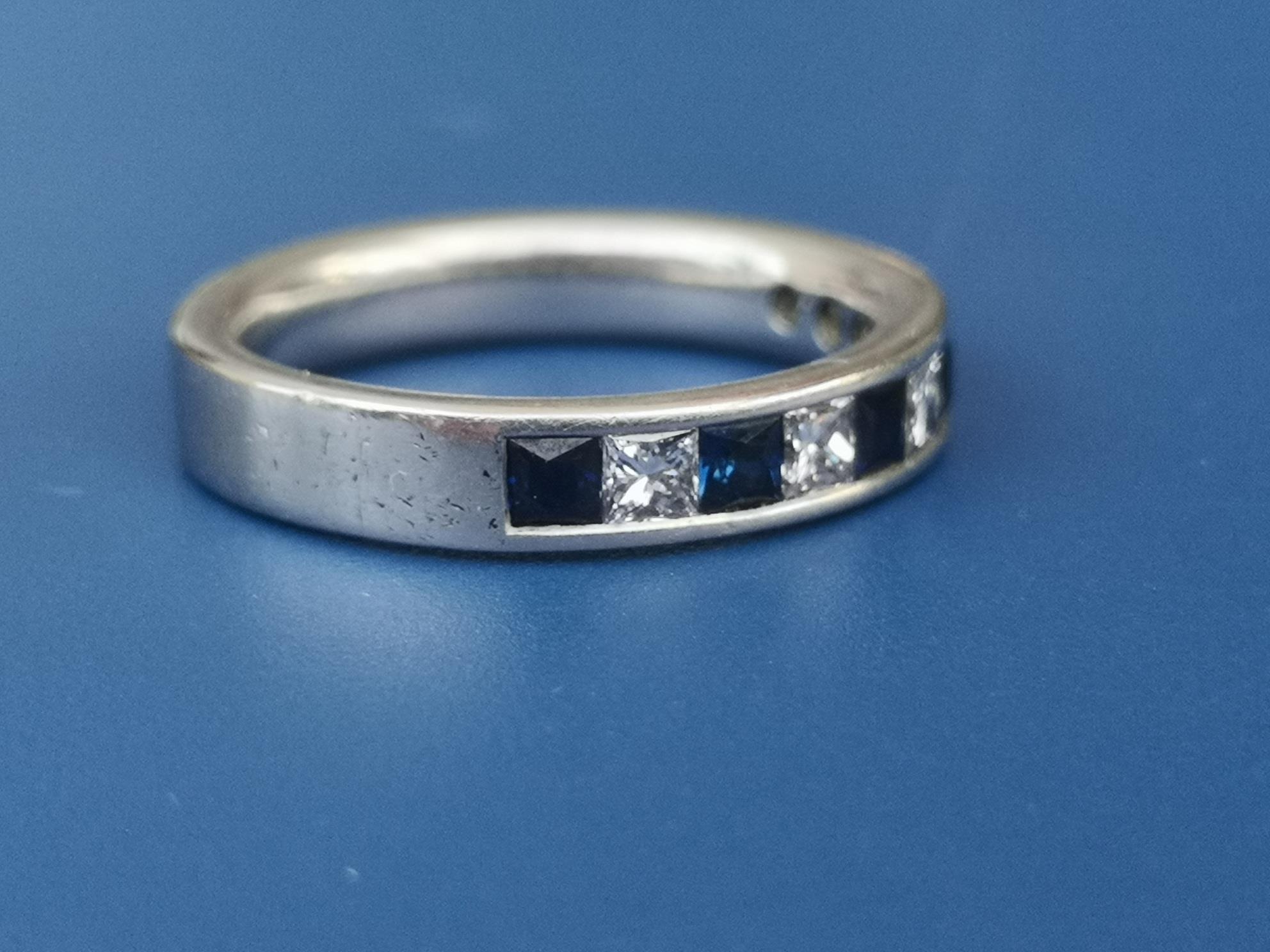 A sapphire & diamond calibre set platinum half eternity ring. Finger size M. - Image 2 of 5