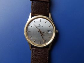 A gent's gold plated Omega Seamaster Quartz with silvered dial, case diameter 32mm, on brown leather