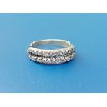 A 19thC twin-row diamond set half eternity ring. Finger size O/P.