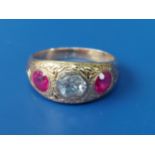 A Victorian diamond & red stone 18ct gold band ring, the setting engraved with a Celtic knot