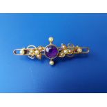 An amethyst & pearl set '15ct' brooch, 1.6".